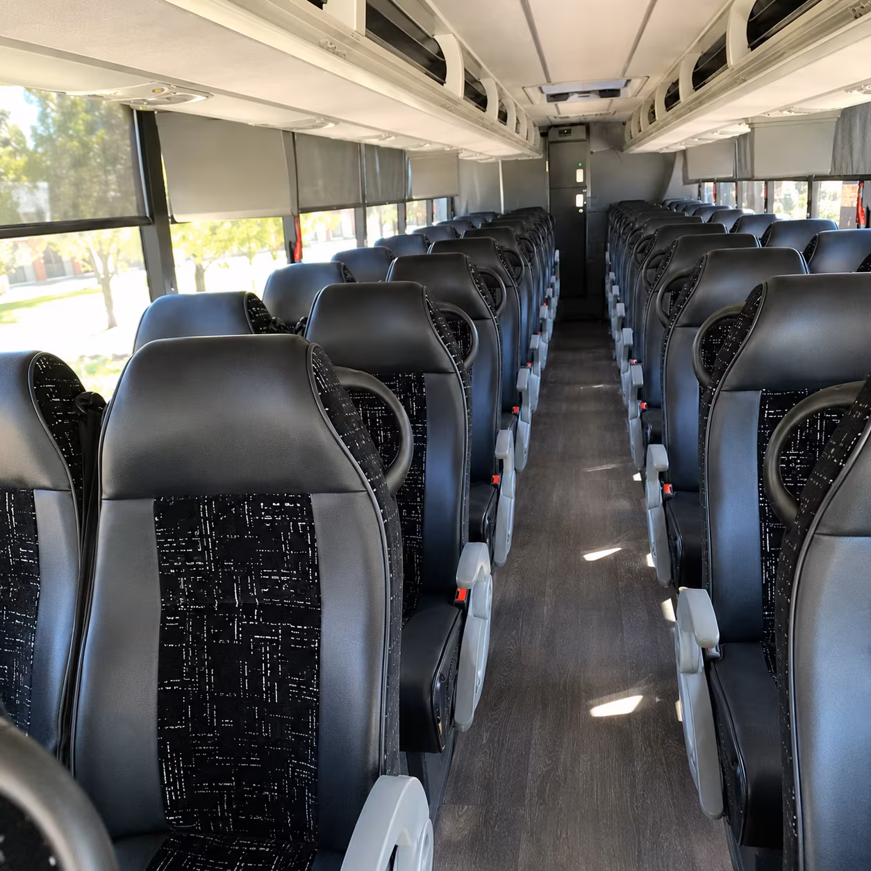 centennial 56 passenger charter bus inside